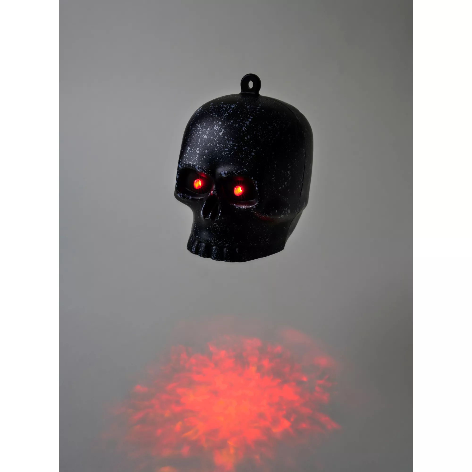 LED Hanging Black Skull Lightshow Projection at Spirit Halloween