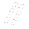Multi-Pack Glow In The Dark Horseshoe Rings - 4 Pair at Spencer's
