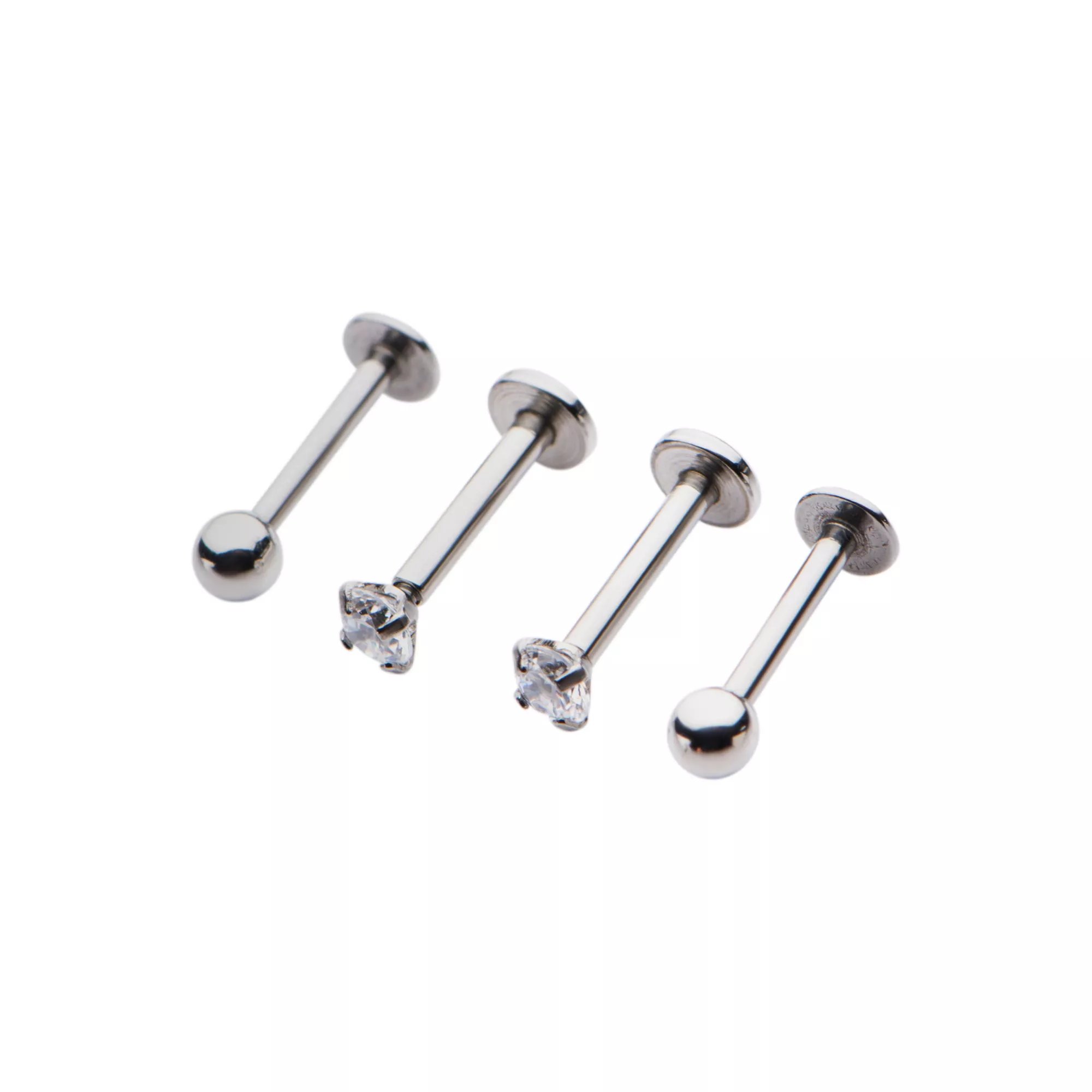 Multi-Pack CZ Labret Lip Rings 4 Pack - 16 Gauge at Spencer's