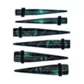 Multi-Pack Black and Green Swirl Tapers - 3 Pair at Spencer's