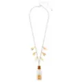 Tooth Charm and Jar Necklace at Spencer's