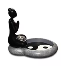 Tranquil Yin Yang Woman Backflow Incense Burner at Spencer's