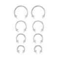 Multi-Pack Silvertone Glitter Horseshoe Rings 4 Pair - 16 Gauge at Spencer's