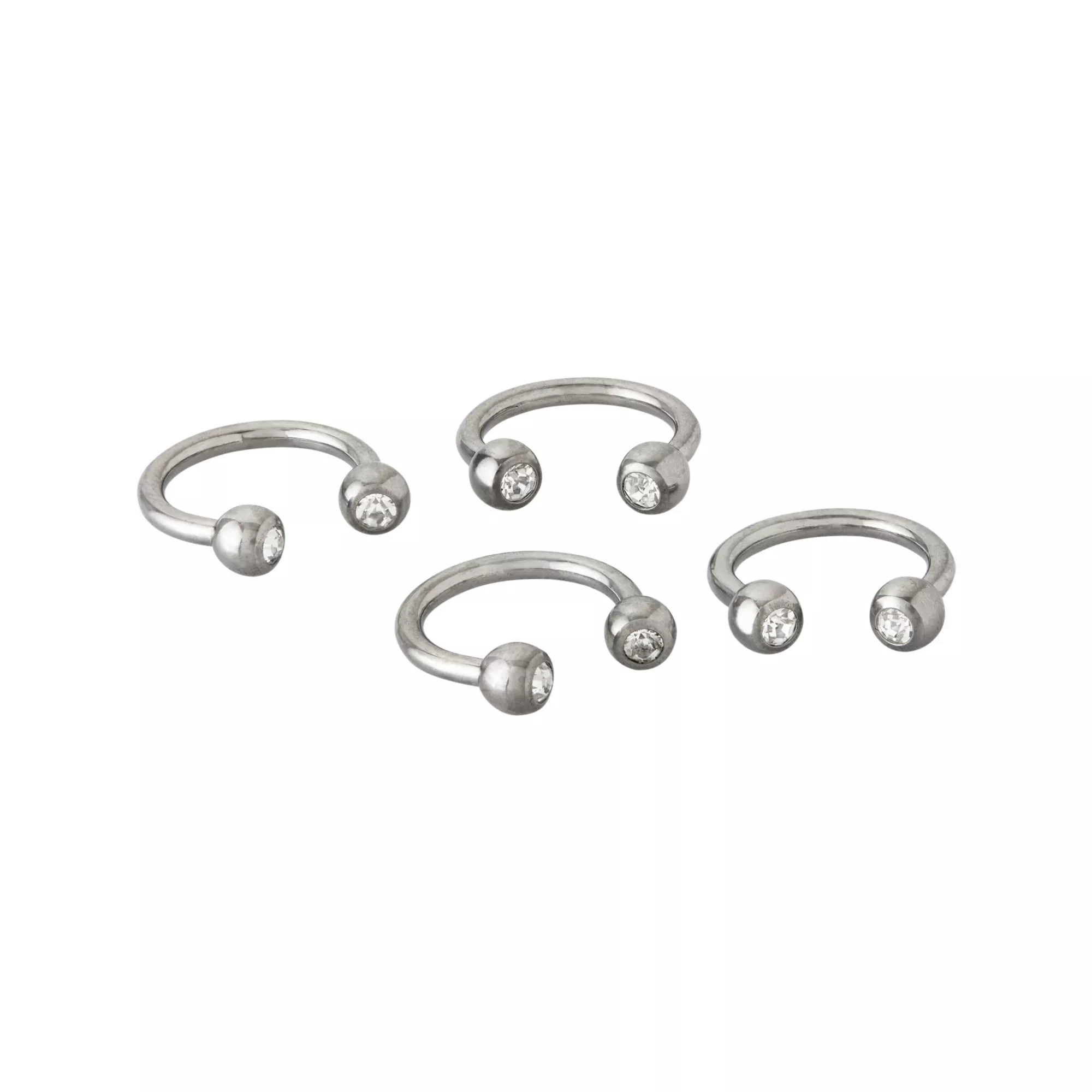 Multi-Pack CZ Silvertone Titanium Horseshoe Rings 4 Pack - 16 Gauge at Spencer's