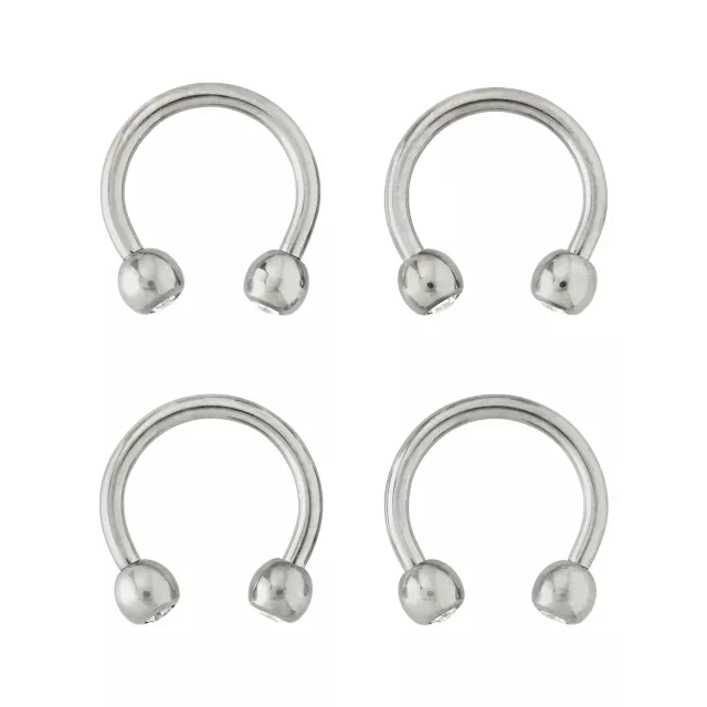 Multi-Pack CZ Silvertone Titanium Horseshoe Rings 4 Pack - 16 Gauge at Spencer's