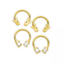 Multi-Pack Goldtone ASTM F-136 Titanium CZ Playboy Bunny Horseshoe Rings 2 Pair - 16 Gauge at Spencer's