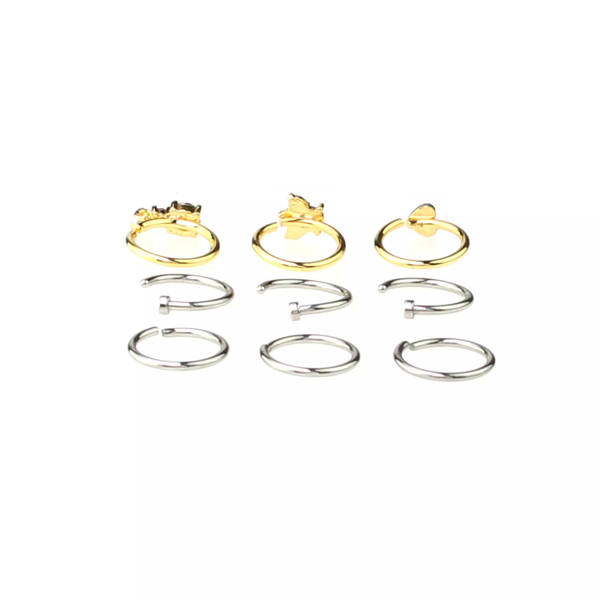 Multi-Pack CZ Heart Goldtone and Silvertone Hoop and Half Hoop Nose Rings 9 Pack - 18 Gauge at Spencer's