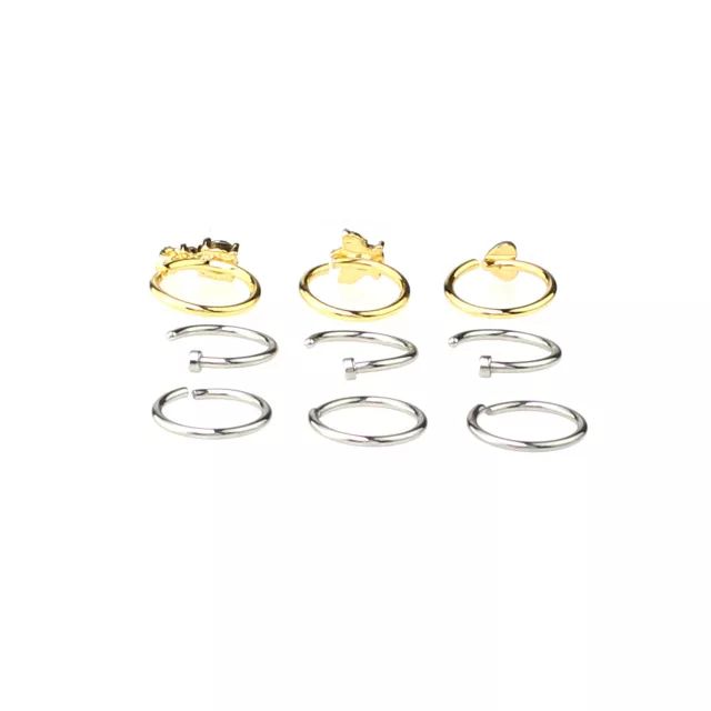 Multi-Pack CZ Heart Goldtone and Silvertone Hoop and Half Hoop Nose Rings 9 Pack - 18 Gauge at Spencer's