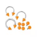 Kayla Malecc Multi-Pack Titanium Horseshoe Rings with Neon Orange Ends and Extra Balls 3 Pack - 20-16 Gauge at Spencer's