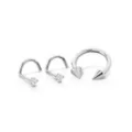 Kayla Malecc Multi-Pack CZ  Titanium Horseshoe Ring and Screw Nose Rings with Silvertone Ends 3 Pack - 20-16 Gauge at Spencer's