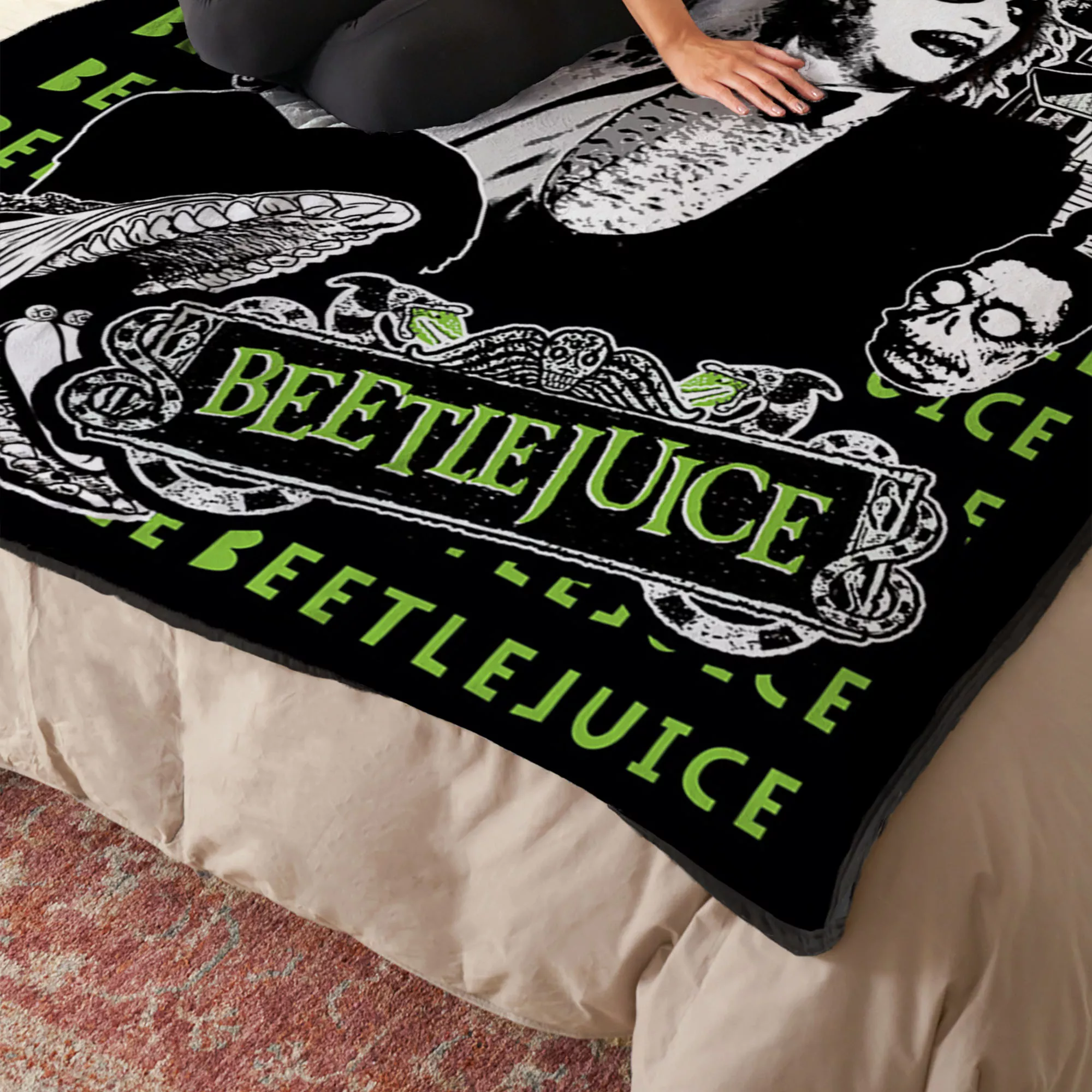 Beetlejuice and Lydia Fleece Blanket at Spencer's
