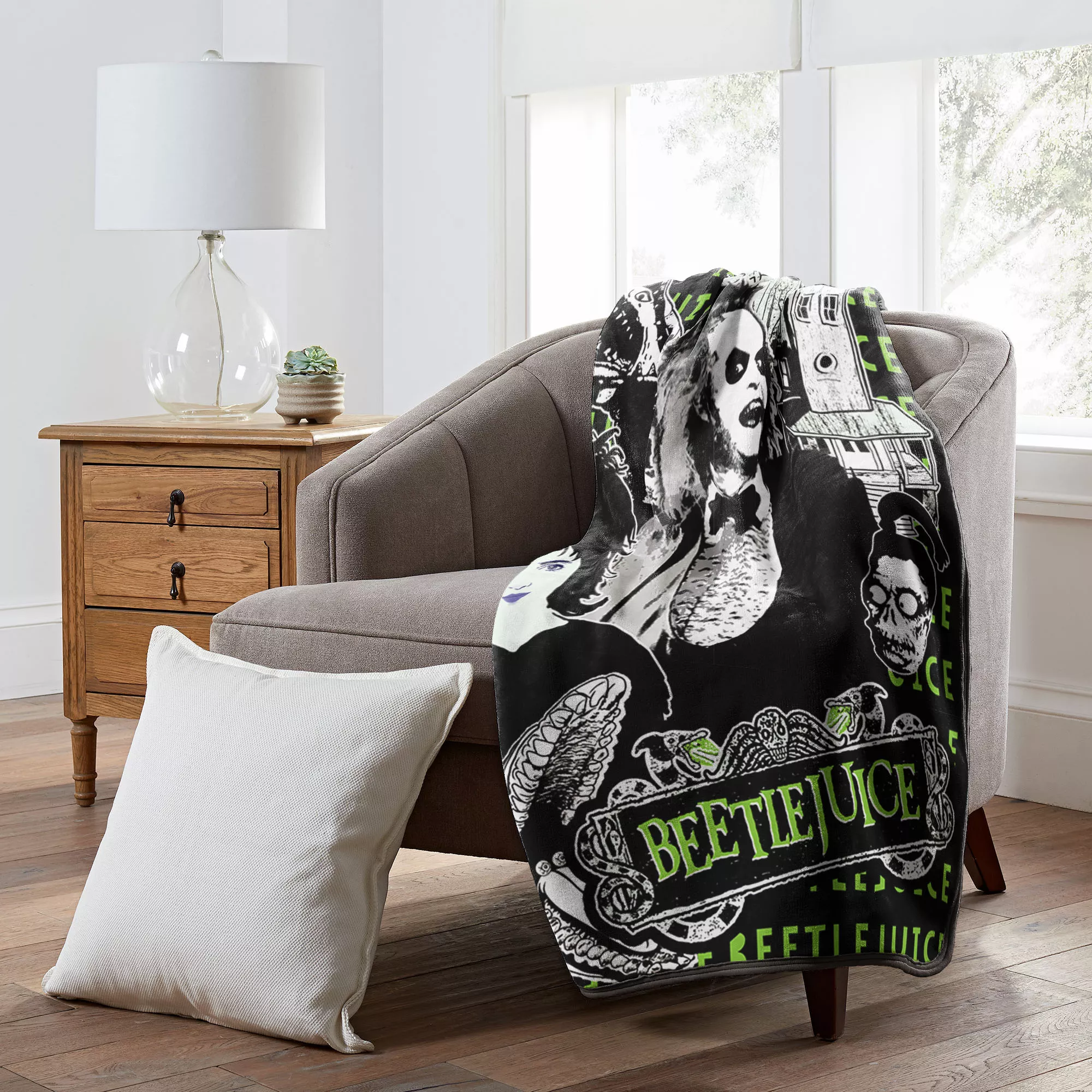 Beetlejuice and Lydia Fleece Blanket at Spencer's