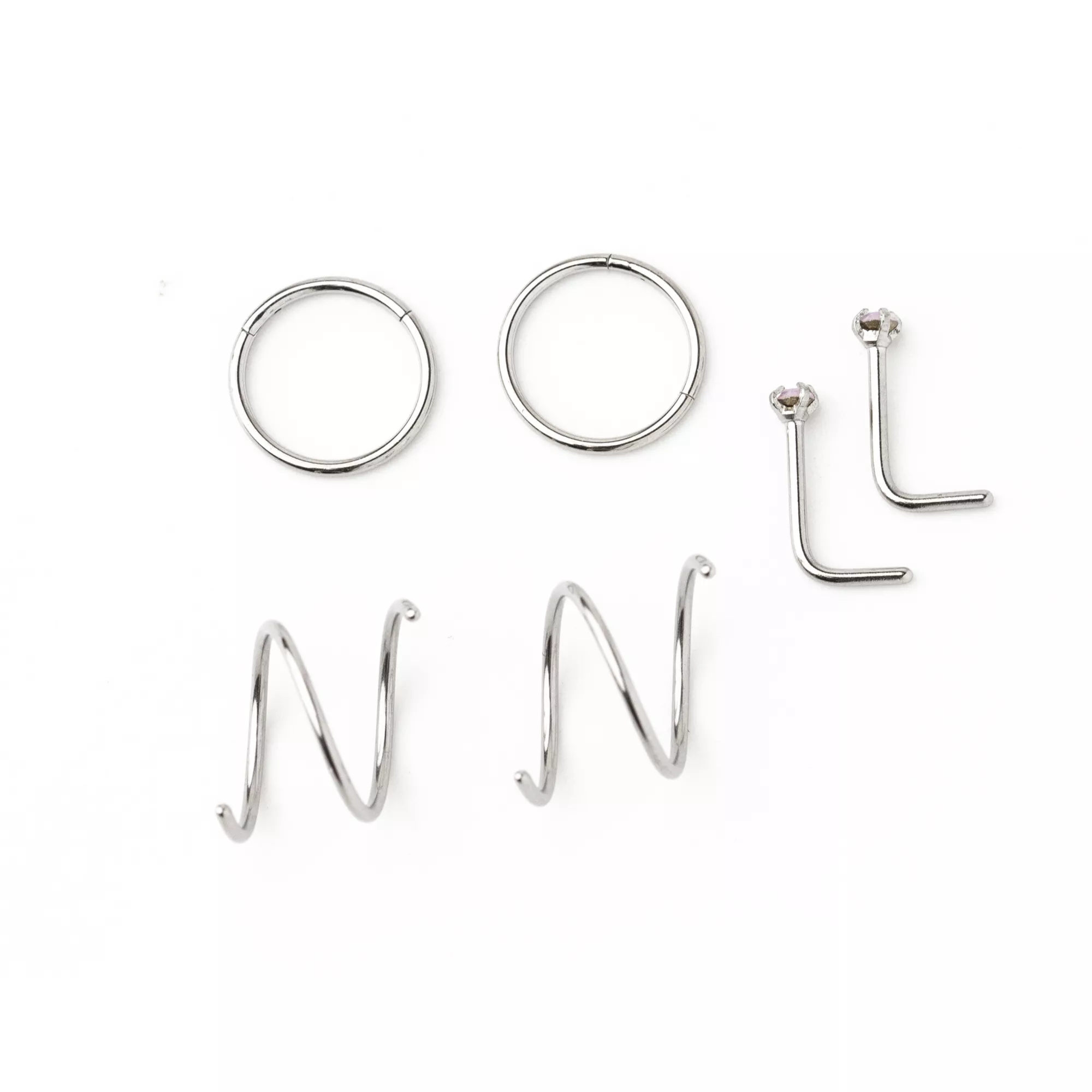 Multi-Pack CZ Pink L-Bend and Spiral Hoop Nose Rings 6 Pack - 20 Gauge at Spencer's