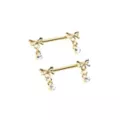 Gold Bow Dangle Nipple Barbells - 14 Gauge at Spencer's
