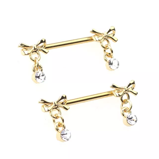 Gold Bow Dangle Nipple Barbells - 14 Gauge at Spencer's