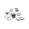 Multi-Pack Silvertone Fuck You and Skulls and Spikes Rings - 9 Pack at Spencer's