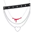 Multi-Pack Spiked Bloody Heart Choker Necklaces - 4 Pack at Spencer's