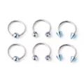Multi-Pack Blue and Silvertone Horseshoe and Captive Rings 3 Pair - 16 Gauge at Spencer's
