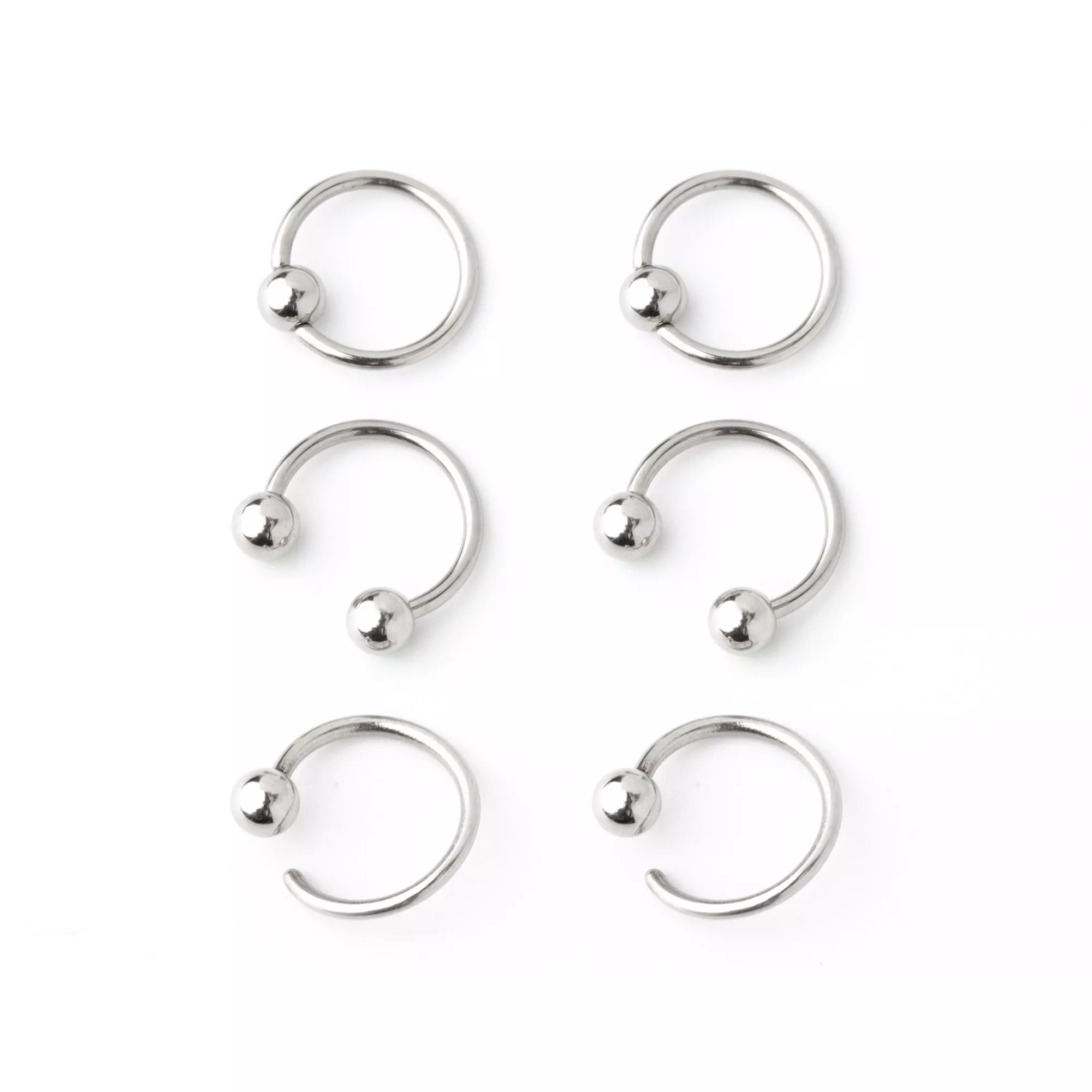 Multi-Pack Green CZ Horseshoe and Captive Rings 3 Pair - 16 Gauge at Spencer's