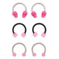 Multi-Pack Pink Titanium Skull and Dice Horseshoe Rings 3 Pair - 16 Gauge at Spencer's