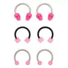 Multi-Pack Pink Titanium Skull and Dice Horseshoe Rings 3 Pair - 16 Gauge at Spencer's
