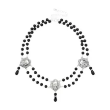 Black Skull Rosary Choker Necklace at Spencer's