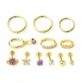 Multi-Pack CZ Purple and Clear Goldtone Cartilage Earrings 12 Pack - 18 Gauge at Spencer's
