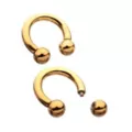 Gold Plated Ball End Horseshoe Rings at Spencer's