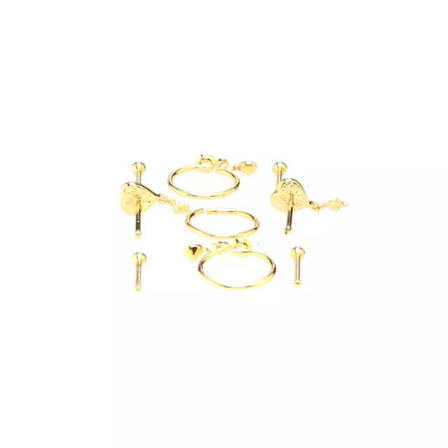 Multi-Pack Gold-Toned Antique Heart Nose Pins and Hoops 9 Pack - 20 Gauge at Spencer's
