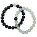 Iridescent Green and Black Long Distance Bracelets - 2 Pack at Spencer's