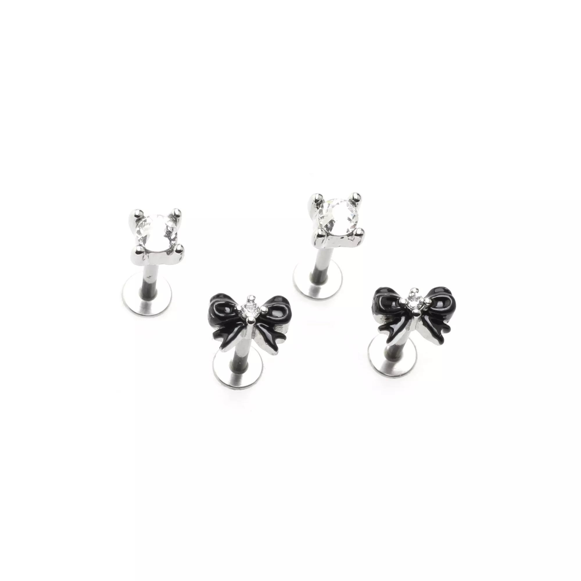 Multi-Pack Clear CZ and Black Bow Labret Rings 4 Pack - 16 Gauge at Spencer's