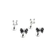 Multi-Pack Clear CZ and Black Bow Labret Rings 4 Pack - 16 Gauge at Spencer's