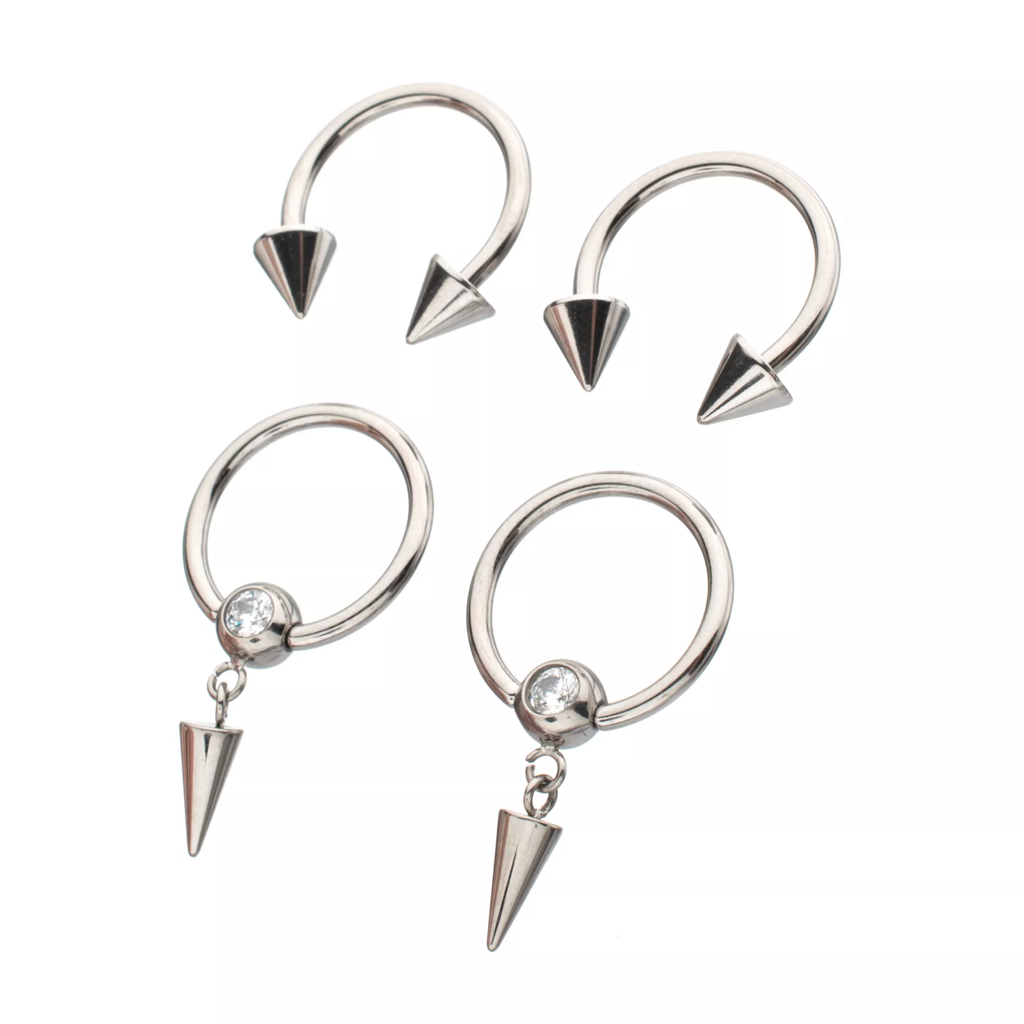 Multi-Pack CZ Titanium Horseshoe Rings and Dangle Captive Rings 2 Pair - 16 Gauge at Spencer's