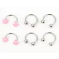 Multi-Pack Pink Butterfly and Pronged Horseshoe Rings - 6 Pack at Spencer's