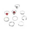 Multi-Pack Red Heart Skull Assorted Rings - 9 Pack at Spencer's