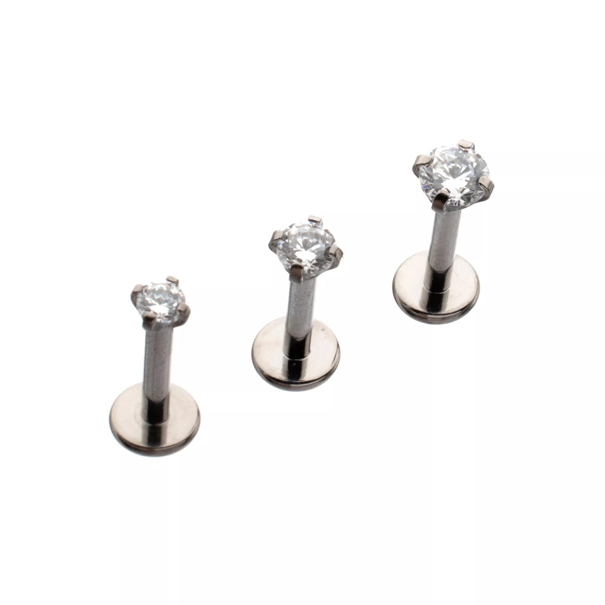 Multi-Pack ASTM F-136 Titanium Clear CZ Pronged Silver-Tone Labret Lip Rings 3 Pack - 16 Gauge at Spencer's