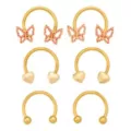 Multi-Pack Gold-Plated Titanium Butterfly Heart Horseshoe Rings 3 Pair - 16 Gauge at Spencer's